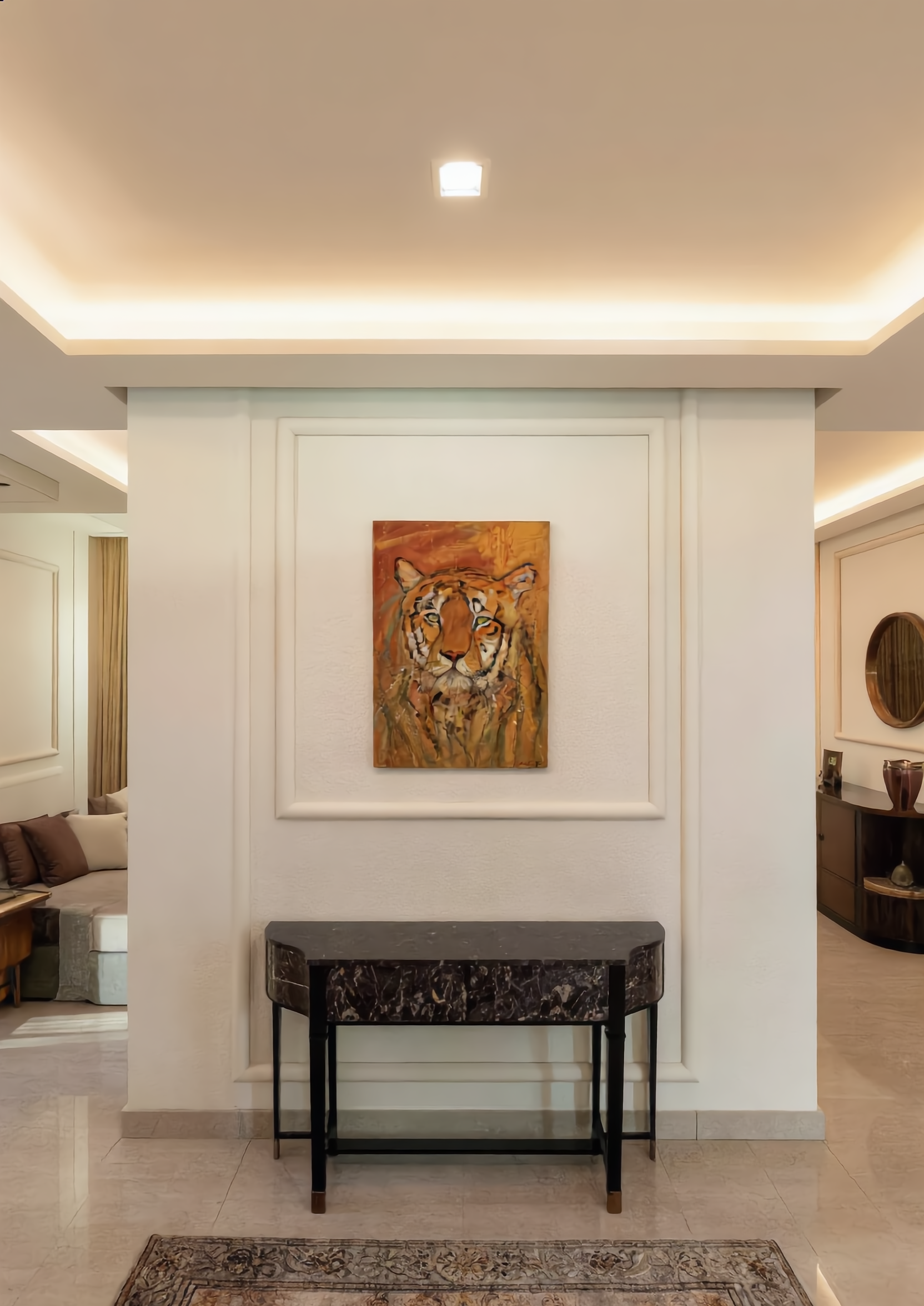 Premium tiger canvas wall art by Swiss artist Heidi Thöni displayed in a contemporary luxury entrance hall with minimalist interior design