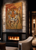 Premium tiger canvas wall art by Swiss artist Heidi Thöni displayed above a modern fireplace in a luxury living room